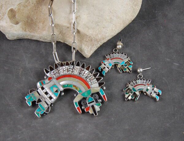 A necklace and earrings set with an animal design.